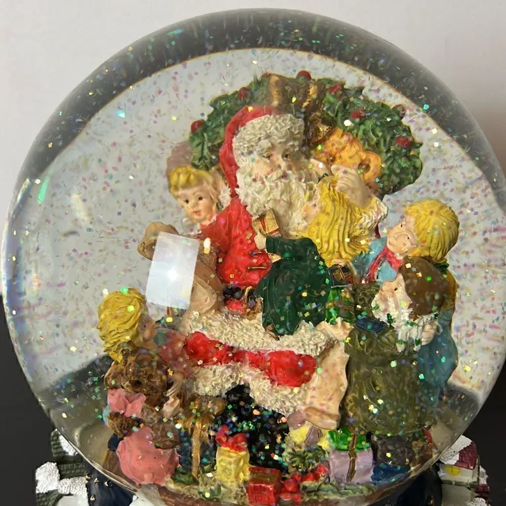 World bazaars Christmas  Santa and children snow globe